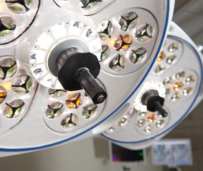 Two Skytron Aurora Four surgical lights in Operating Room