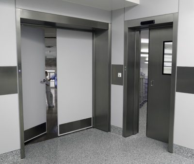 Two Skytron EASE Modular Doors in medical setting, one hinged and one sliding