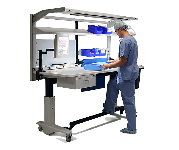 Skytron ErgoStat Prep & Pack Workstation in use by medical personnel in scrubs, no background