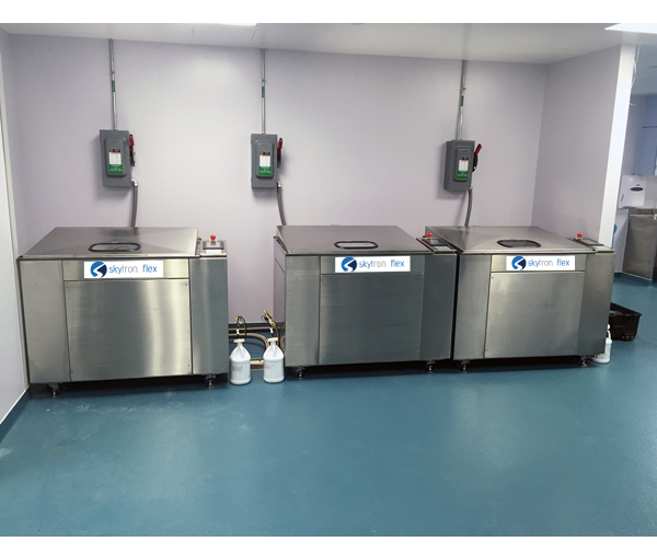 Three Skytron Flex Ultrasonic Washer Disinfectors side by side in medical setting