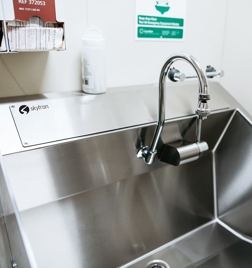 Skytron Stainless Steel sink installed in medical setting close-up
