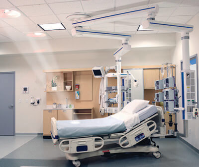 Labor and Delivery room with Skytron Lucina 4 lights directing light on the patient bed